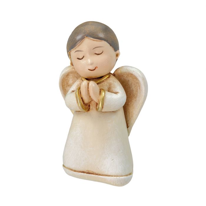 Ángel de Navidad rezando