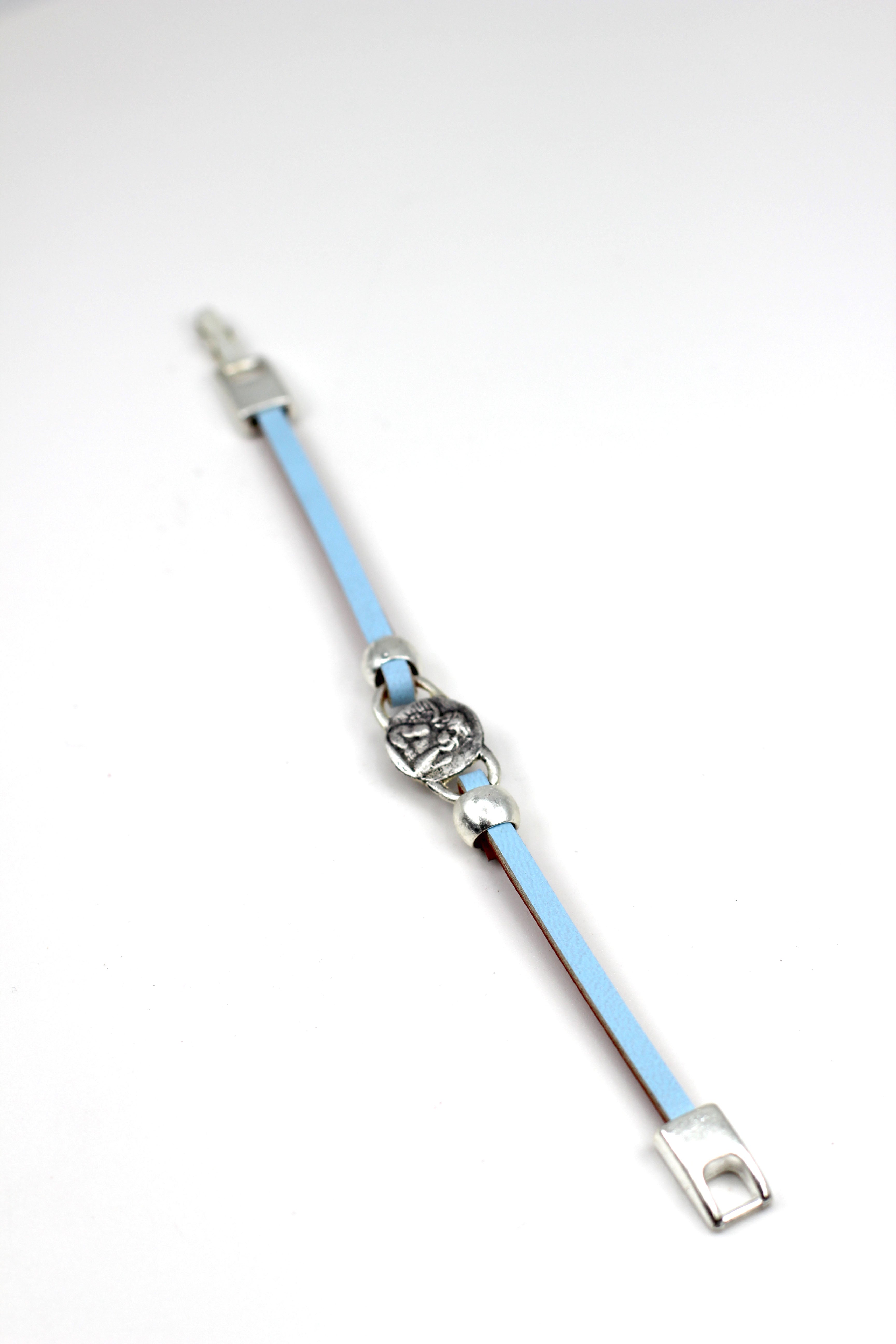 Pulsera Niña El Ángel de la Guarda joyería artesanal con una sola tira de piel de la Colección Graciela