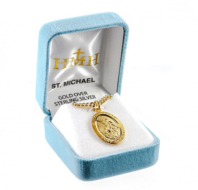 Medalla ovalada de oro sobre plata de ley de San Miguel Patrón