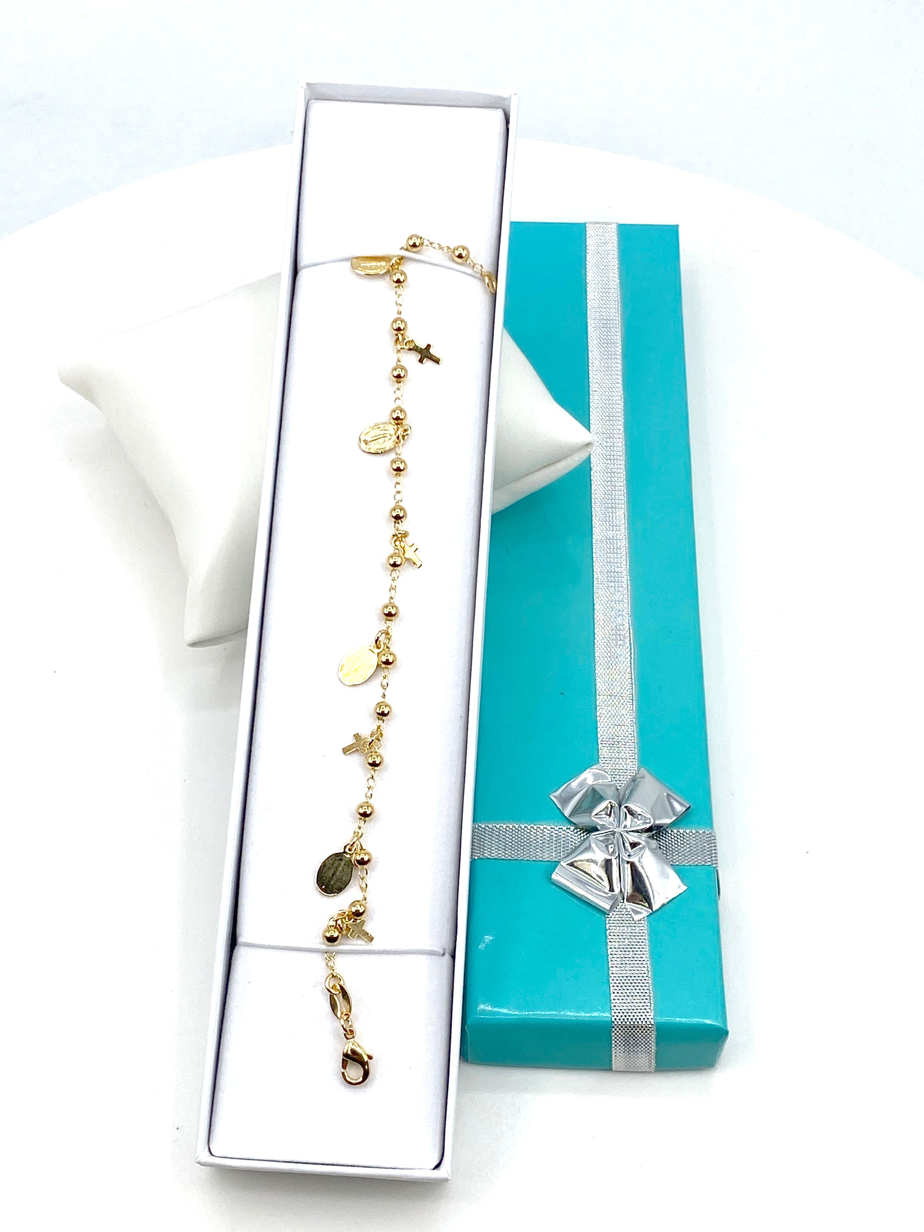 Pulsera con charms de Virgen de Gracia y Cruces