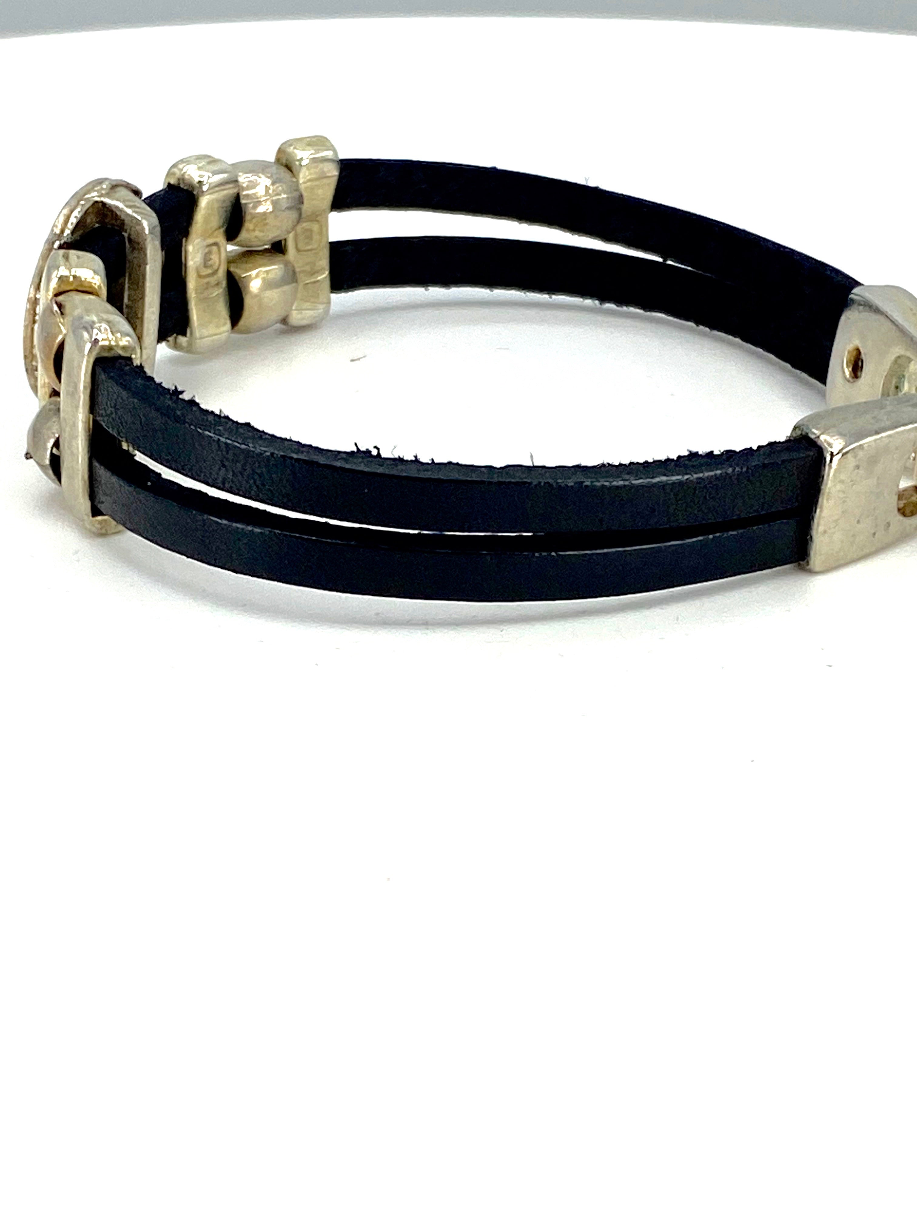 Pulsera Vintage El Espíritu Santo joyería hecha a mano con tiras de Cuero de Graciela's Collection