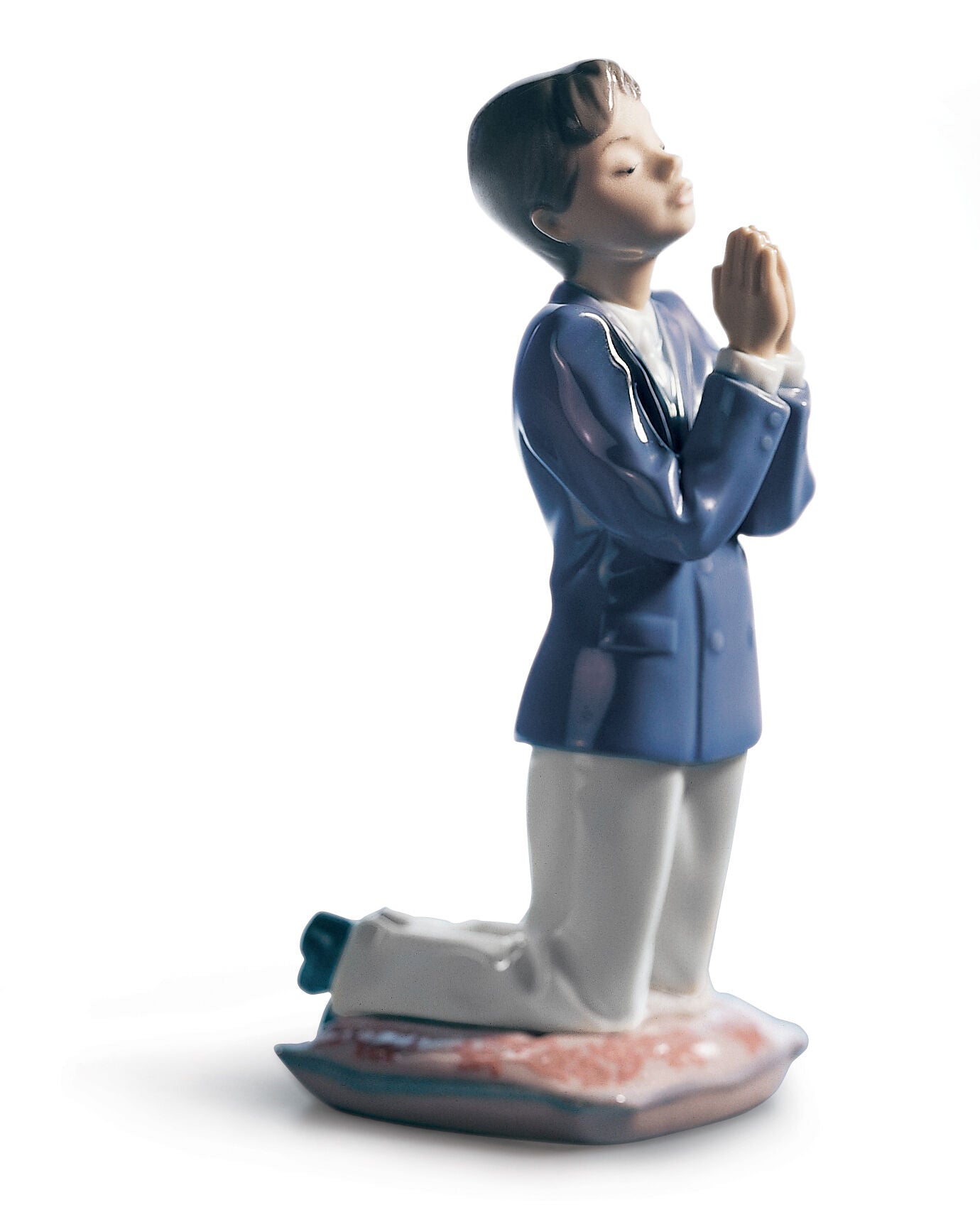 Figura de niño con oración de comunión