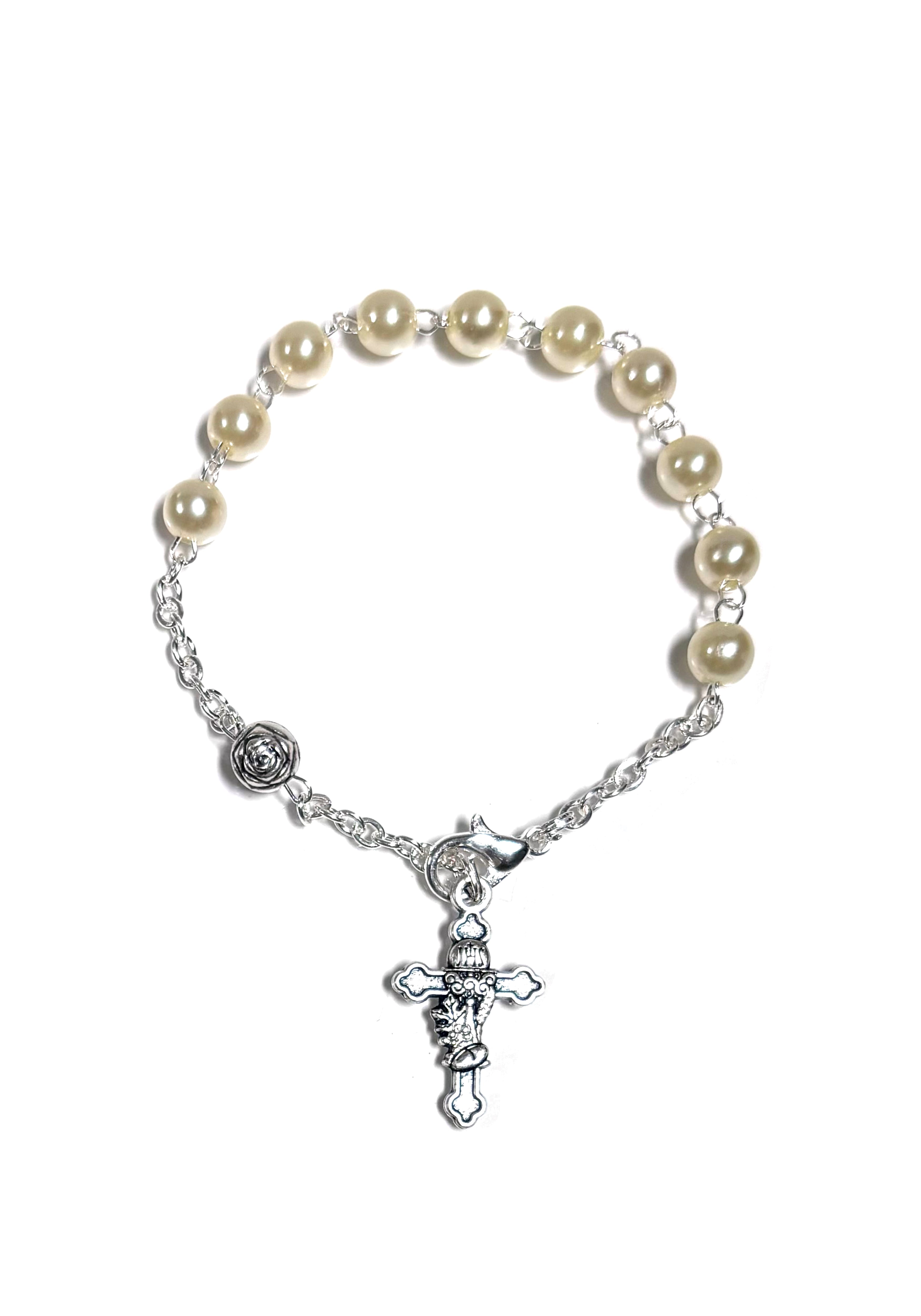Pulsera de plata y perlas con cruz de comunión