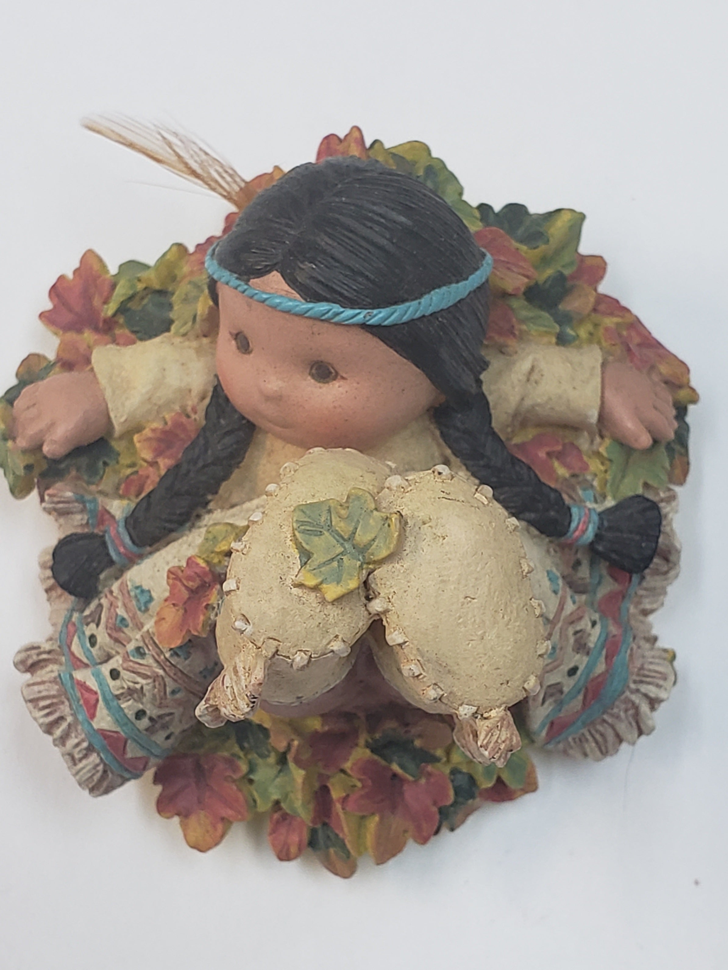 Figuras de nativos americanos de la colección Friends Of The Feather de Enesco