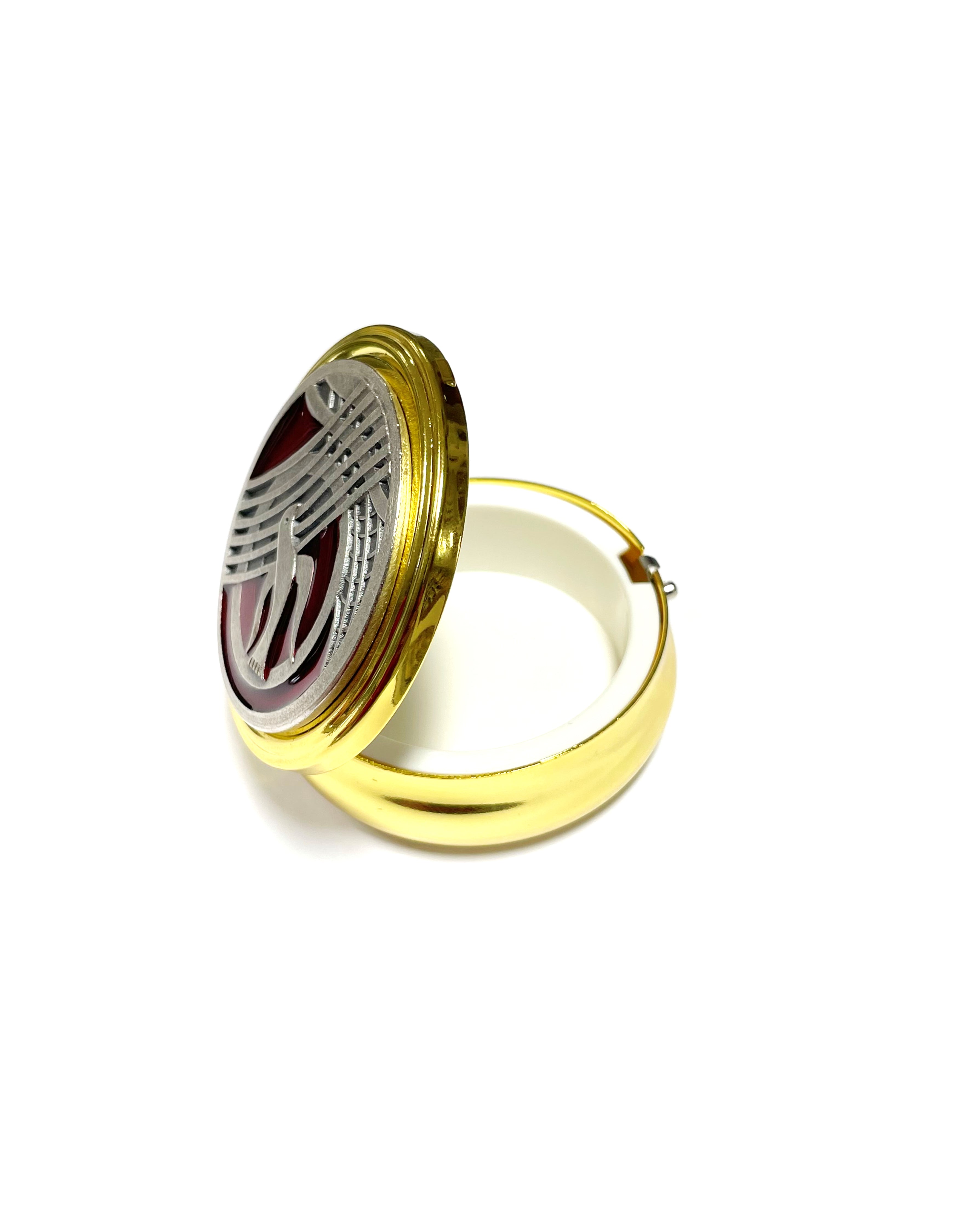 Píxus dorado y plateado
