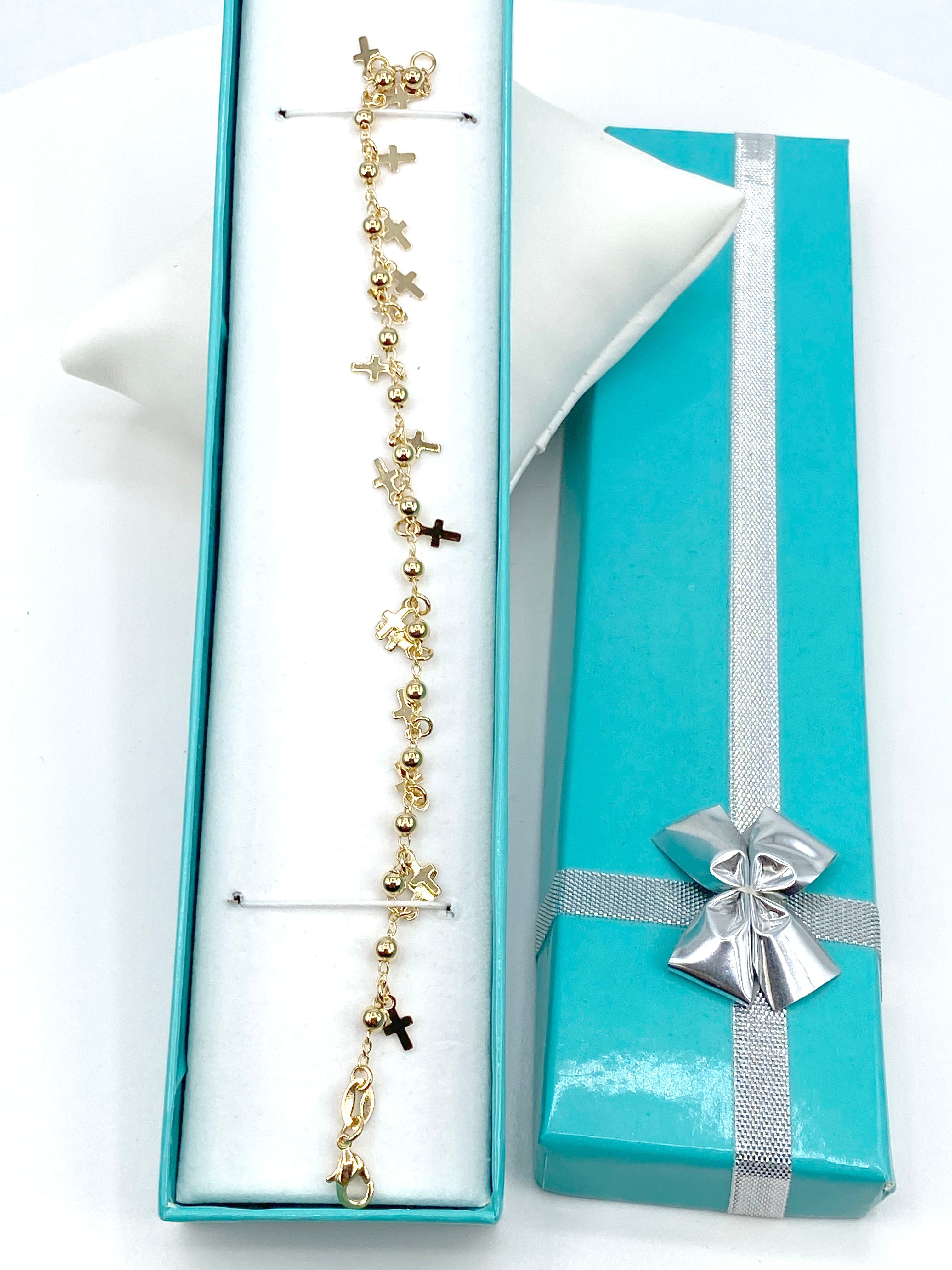 Pulsera con dijes de cruz