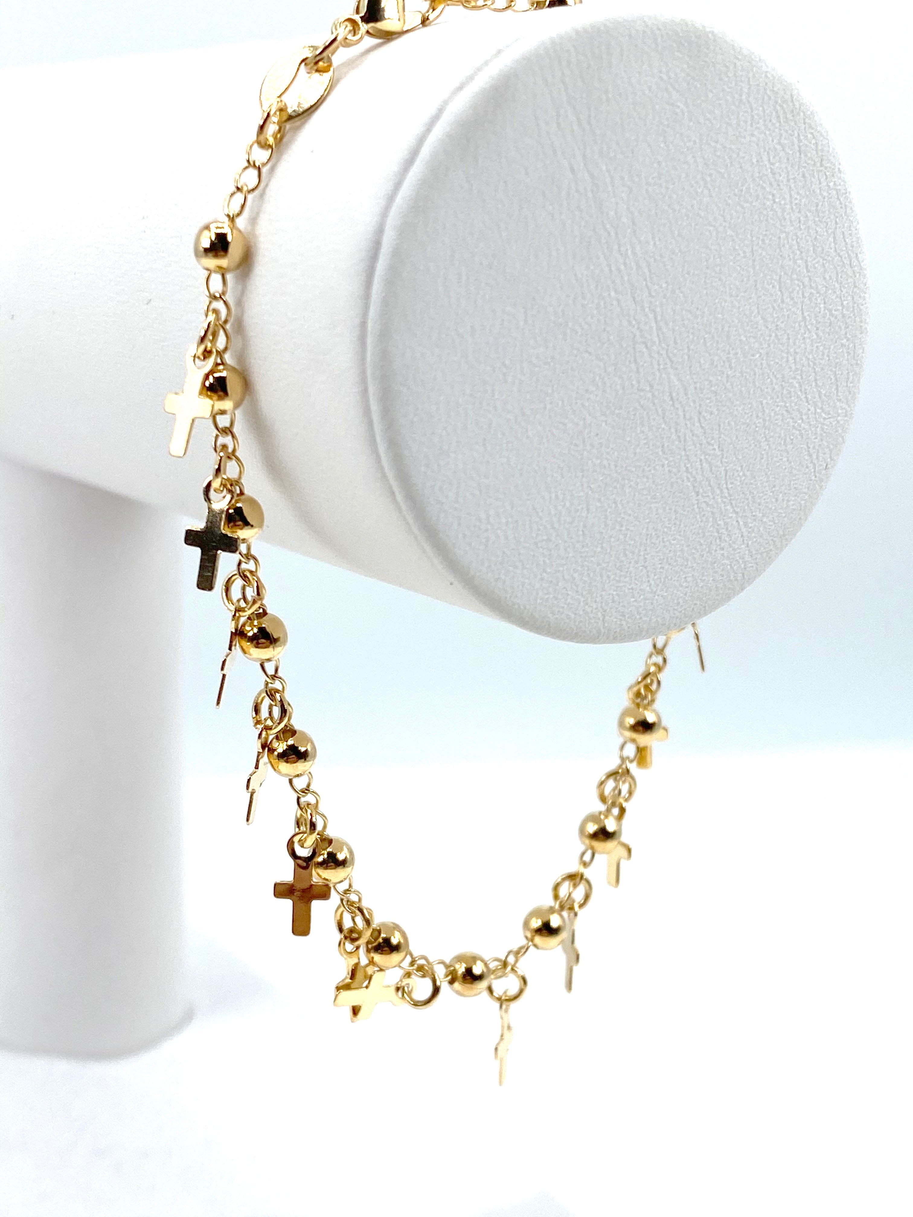 Pulsera con dijes de cruz