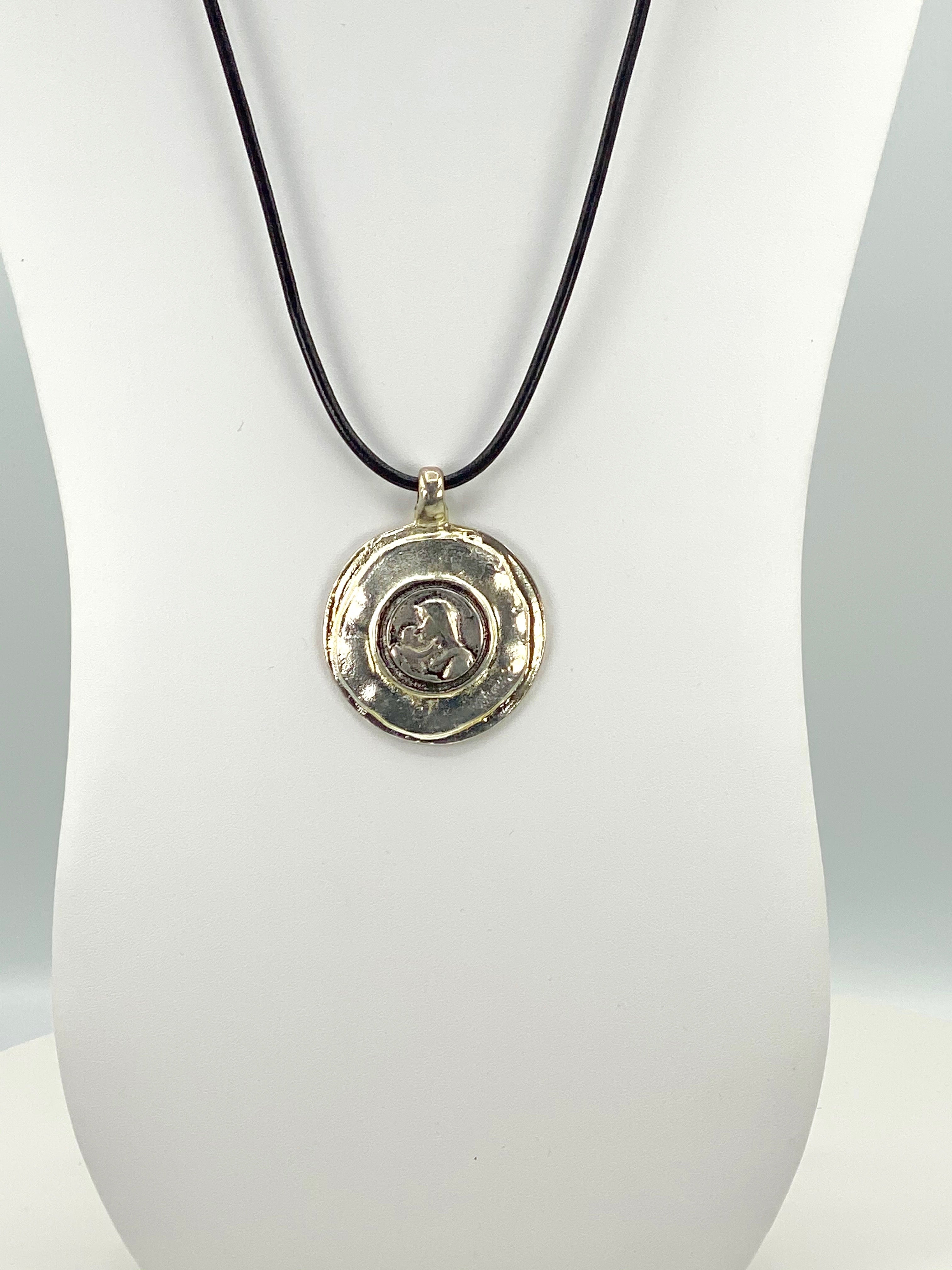 Vintage The Madonna and Child Jesus Medallion Necklace  Handmade Jewelry with Genuine Leather Strap by Graciela's Collection